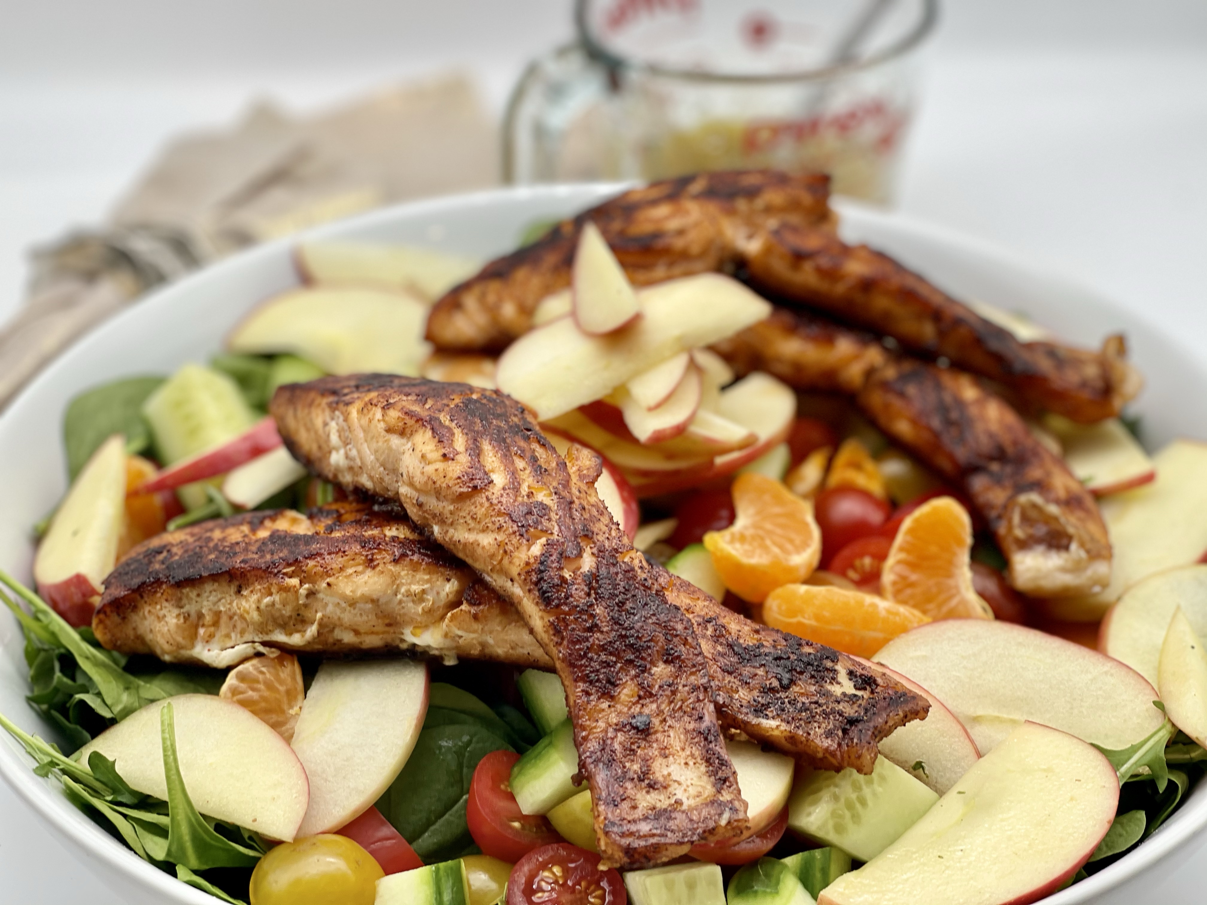 Spinach, Arugula and Fruits Salad with Tarragon Dilled Vinaigrette and Pan Fried Salmon